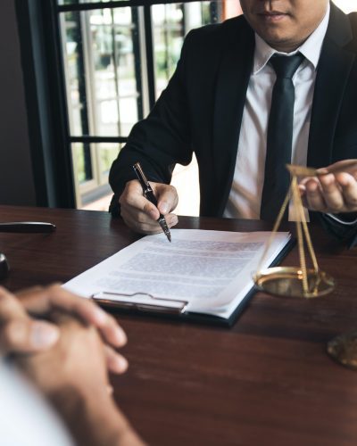 Business lawyer is currently counseling the client's trial at the lawyer office.